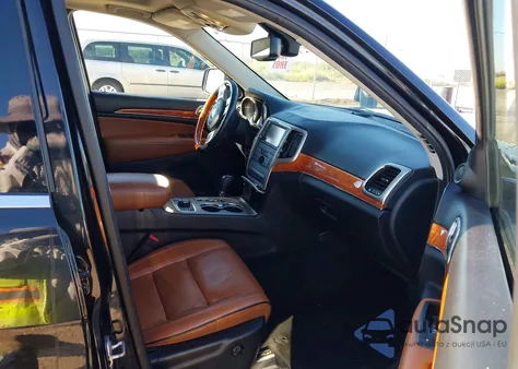 2012 Jeep Grand Cherokee Overland z USA, uszkodzony, nr VIN 1C4RJFCT4CC128399